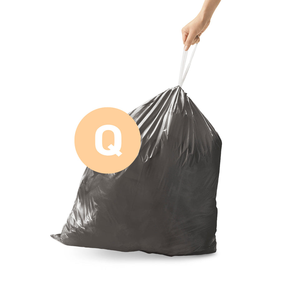 Simplehuman Code Q Custom Fit Odorsorb Liner pulled closed by hand, featuring secure drawstring closure.